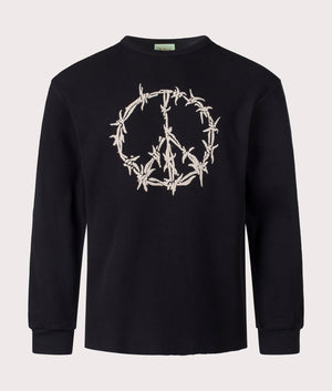 Aries Peace Press Gothic Waffle Long Sleeve T-Shirt in Black. Front Shot at EQVVS.