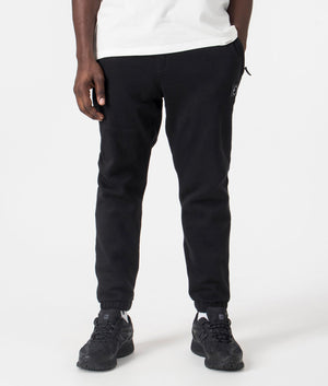 Regular Fit Siren Joggers Black Marshall Artist. Model shot at EQVVS.  Front angle. 