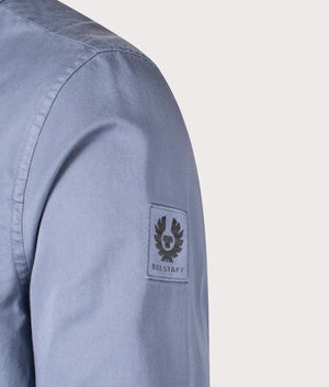 Belstaff Scale Shirt in Blue Flint, 100% Cotton. At EQVVS Menswear. Front angle logo shot