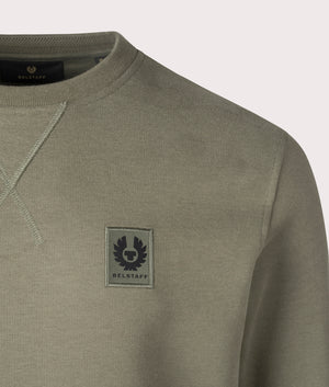 Belstaff Sweatshirt in Surplus Green, 100% Cotton. At EQVVS Menswear. Front logo shot 