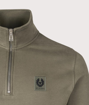 Belstaff Quarter Zip Sweatshirt in Surplus Green. Shot at EQVVS. Detail shot. 