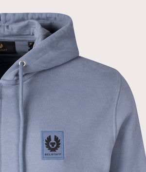 Belstaff Zip Through Hoodie in Blue Flint, 100% Cotton. At EQVVS Menswear. Front logo shot 