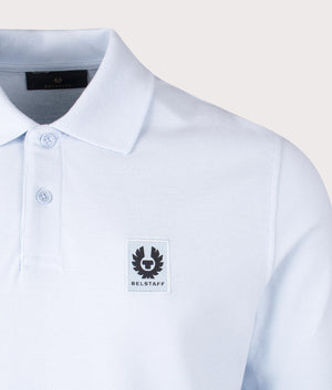 Belstaff Long Sleeved Polo Shirt in Sky Blue, 100% Cotton. At EQVVS Menswear. Front logo shot