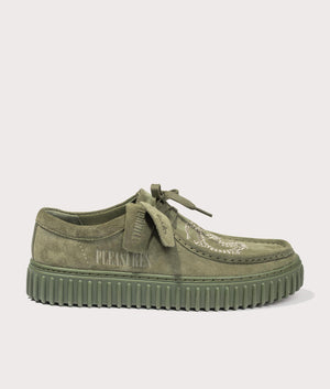 Clarks X Pleasures Torhill DRGN Lo Shoes in Olive Suede at EQVVS. Side solo shot. 