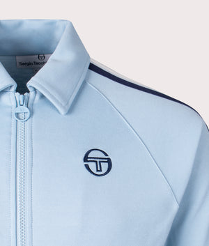 Renshaw Track Top Sergio Tacchini, celestial blue. Shot at EQVVS. Detail shot. 
