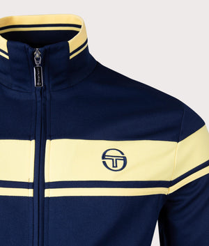 Damarindo Track Top in Maritime Blue and Lemon Drop by Sergio Tacchini. EQVVS Menswear Front Detail Shot. 