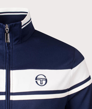 Sergio Tacchini Damarindo Track Top in Maritime Blue/Gardenia/Maritime Blue. Shot at EQVVS. Detail shot