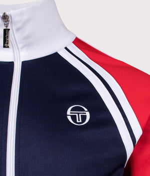 Sergio Tacchini Ghibli Tracktop in Maritime Blue/Adrenaline Rush/White. Shot at EQVVS. Detail shot