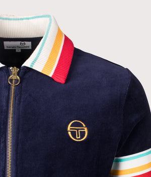 Sergio Tacchini Slice Velour Track Top in Maritime Blue/Gold. Shot at EQVVS. Detail shot. 