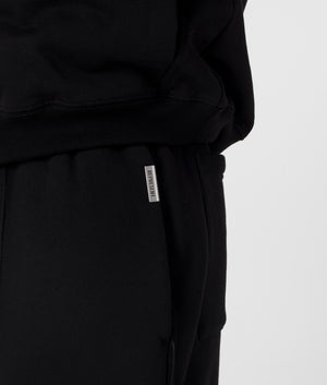 REPRESENT Initial Joggers in Black. Shot at EQVVS. Detail shot. 