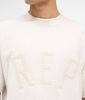 REPRESENT Rep Applique T-Shirt in Cream Marl. Shot at EQVVS. Detail shot. 