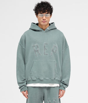 REPRESENT Rep Applique Hoodie in Forest Green. Shot at EQVVS. Front shot. 