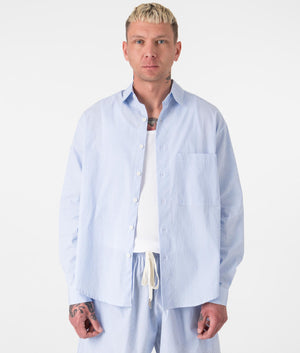 Oversized Striped Dress Shirt in Blue by MKI MIYUKI ZOKU. EQVVS Front Angle Shot.