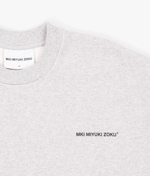 Oversized Uniform Crewneck Sweatshirt in Grey from MKI MIYUKI ZOKU. Detail shot at EQVVS.