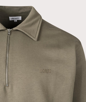 Relaxed Fit Ketel NORSE Logo Quarter Zip Sweatshirt in Sediment Green by Norse Projects. EQVVS Menswear Detail Shot. 