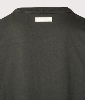 Norse Projects Simon T-Shirt in Black Olive. Shot at EQVVS. Detail shot. 