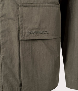 Norse Projects Herluf Tech Poplin Jacket in Ivy Green. Shot at EQVVS. Detail shot. 