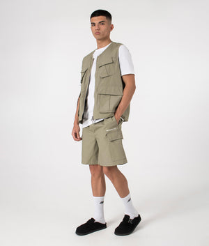 MKI Oversized Ripstop Cargo Vest in Sage Green. Side angle model shot at EQVVS.