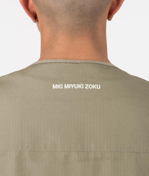 MKI Oversized Ripstop Cargo Vest in Sage Green. Detail angle model shot at EQVVS.