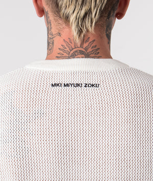 Oversized Loose Gauge Long Sleeve Top in Off White by MKI MIYUKI ZOKU. EQVVS Detail Model Shot.