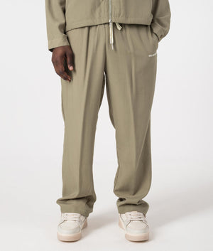 MKI Relaxed Fit Tencel Trousers in Sage Green. Front angle model shot at EQVVS.