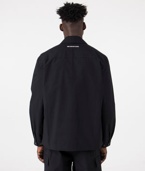 MKI Oversized Ripstop Cargo Jacket in Black. Back angle model shot at EQVVS.