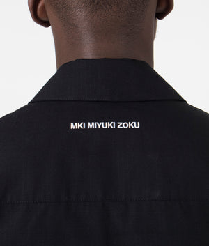 MKI Oversized Ripstop Cargo Jacket in Black. Detail angle model shot at EQVVS.