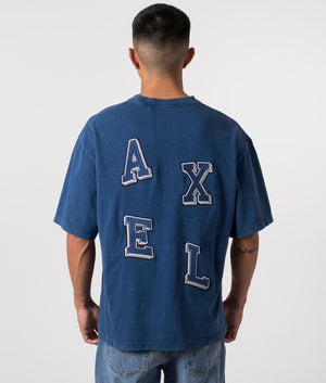 Typo Summer T-Shirt in Blue by Axel Arigato. EQVVS Menswear Back Model Shot. 