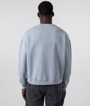 Axel Arigato Distort Washed Sweatshirt in Steel Blue. Shot at EQVVS. Reverse shot. 