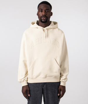 Axel Arigato Motto Hoodie in Pale Beige. Shot at EQVVS.  Front shot. 