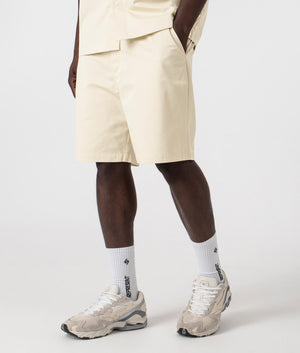 Axel Arigato Stitch Embroidered Shorts in Pale Beige. Shot at EQVVS.  Side shot. 