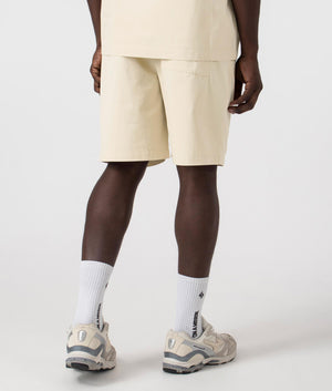 Axel Arigato Stitch Embroidered Shorts in Pale Beige. Shot at EQVVS. Back shot. 