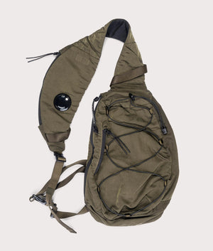 CP Company Nylon B Crossbody Rucksack In Ivy Green at EQVVS menswer front shot