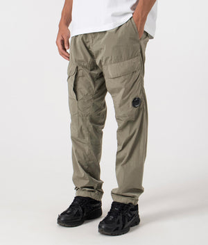 Chrome-R Loose Cargo Pants in Walnut by CP Company. EQVVS Menswear Model Side Shot. 