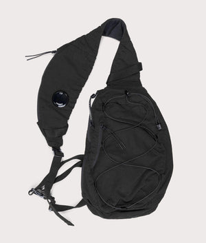 Nylon B Crossbody Rucksack in Black by C.P. Company at EQVVS. Flat Shot.