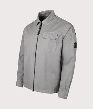 CP Company Organic Gabardine Zip Through Overshirt in smoked pearl Side front shot at EQVVS Menswear