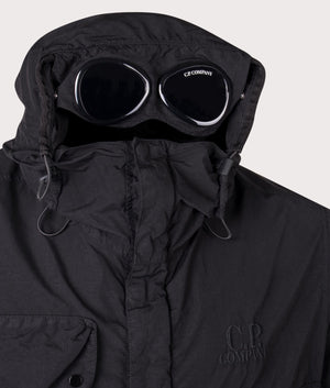 C.P. Company Flatt Nylon Goggle Jacket in black at EQVVS. Goggles shot. 