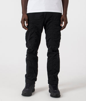 C.P. Company Chrome R Lens Cargo Pants in Black. Shot at EQVVS. Front shot. 