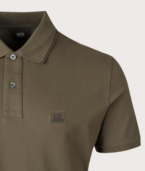 CP Company Polo Shirt in Ivy Green, shot at EQVVS. 