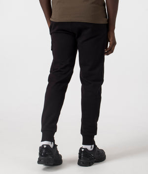 C.P. Company Diagonal Raised Lens Joggers in Black. Shot at EQVVS. Back shot. 