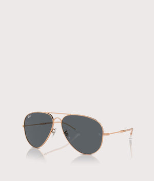 Ray-Ban Old Aviator Sunglasses in Polished Rose Gold with Blue Lenses. Angle SHot at EQVVS.