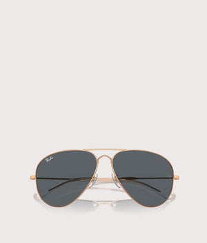 Ray-Ban Old Aviator Sunglasses in Polished Rose Gold with Blue Lenses. folded shot at EQVVS.