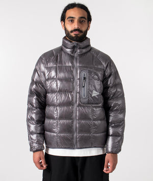 and wander diamond quilt padded jacket in grey. Shot at EQVVS. Front model shot. 