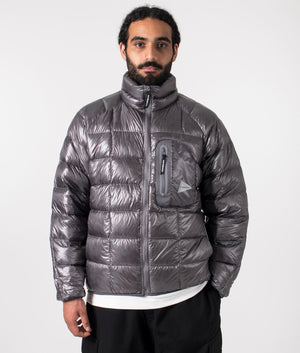 and wander diamond quilt padded jacket in grey. Shot at EQVVS. Front model shot.