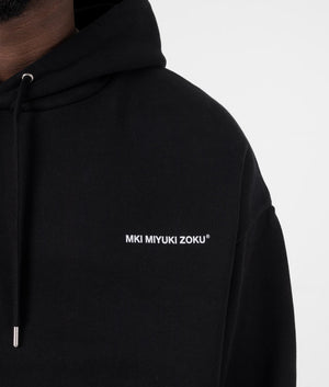 MKI Oversized Uniform Hoodie in Black. Detail angle model shot at EQVVS.