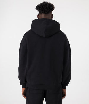 MKI Oversized Uniform Hoodie in Black. Back angle model shot at EQVVS.