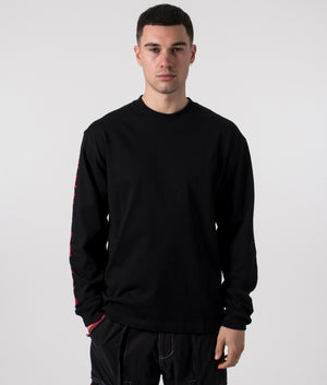 PLEASURES Old English Long Sleeve Top in Black, 100% Cotton. At EQVVS Menswear. Front model shot