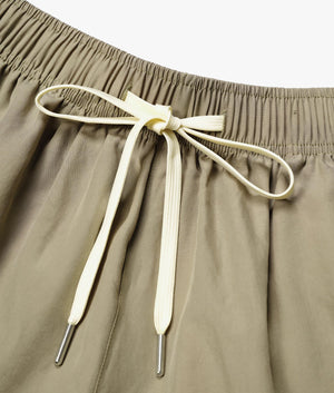 Relaxed Fit Tencel Shorts in Sage Green by MKI MIYUKI ZOKU. EQVVS Detail Shot.