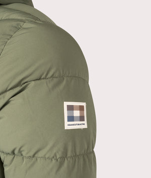 Army Green Hooded Puffer by Aquascutum. Shot at EQVVS. Detail shot. 