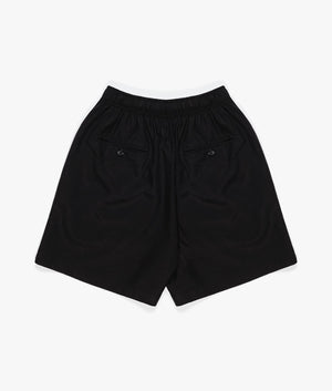 Relaxed Fit Tencel Shorts in Black by MKI MIYUKI ZOKU. EQVVS Back Flat Shot.